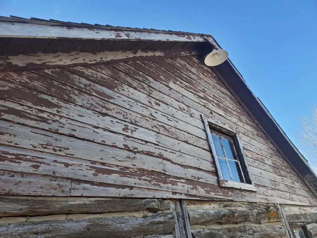 Home with peeling paint in need of lead removal services