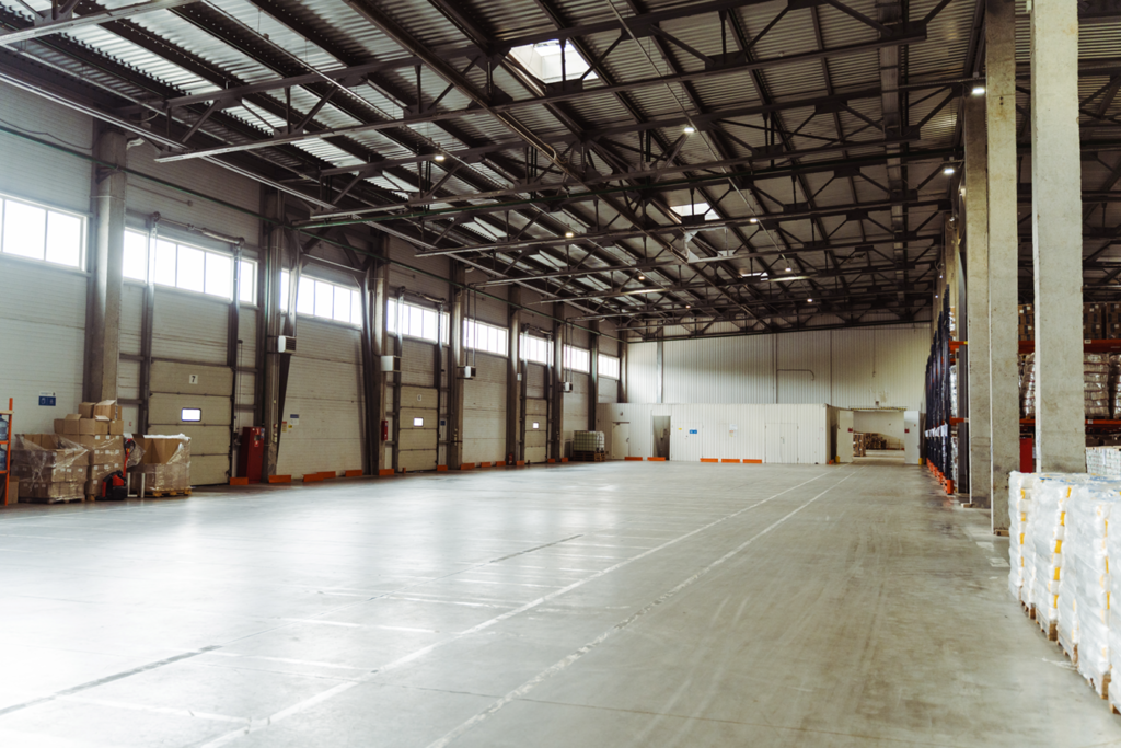 Warehouse with Concrete Floor in Industrial area with restored concrete after grinding and polishing