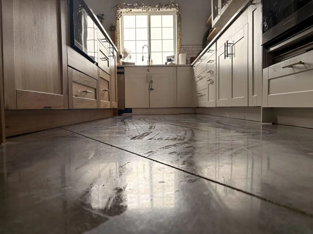 Low Angled Kitchen Galley with polished concrete flooring