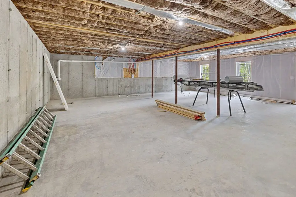 Unfinished-walk-out-basement-with-concrete-flooring
