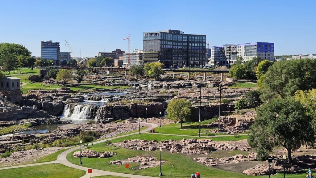 Downtown Sioux Falls and the falls of the Big Sioux river as seen from the viewing tower in Falls Park, September 17 2023
